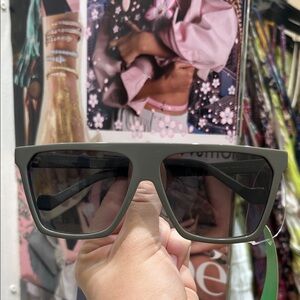 Loewe Gray Sunglasses with Gold Accents